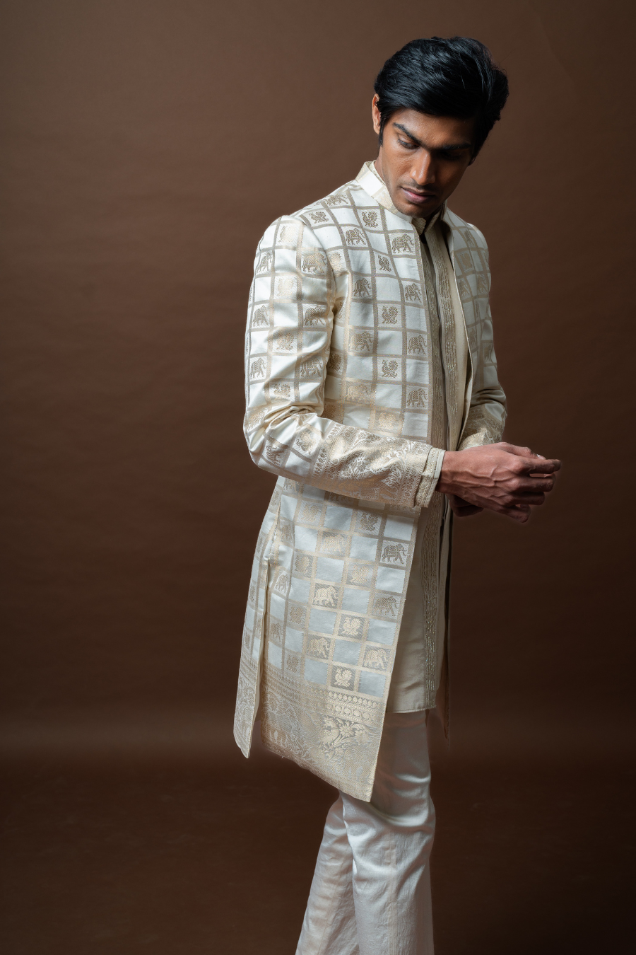 Ivory Brocade Sherwani Set adorned with Royal Grid Motifs