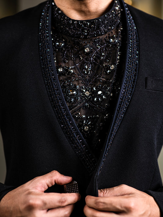Close-up of embellished black Indo-western tuxedo for Indian groom β crystal hand embroidery on sheer fabric