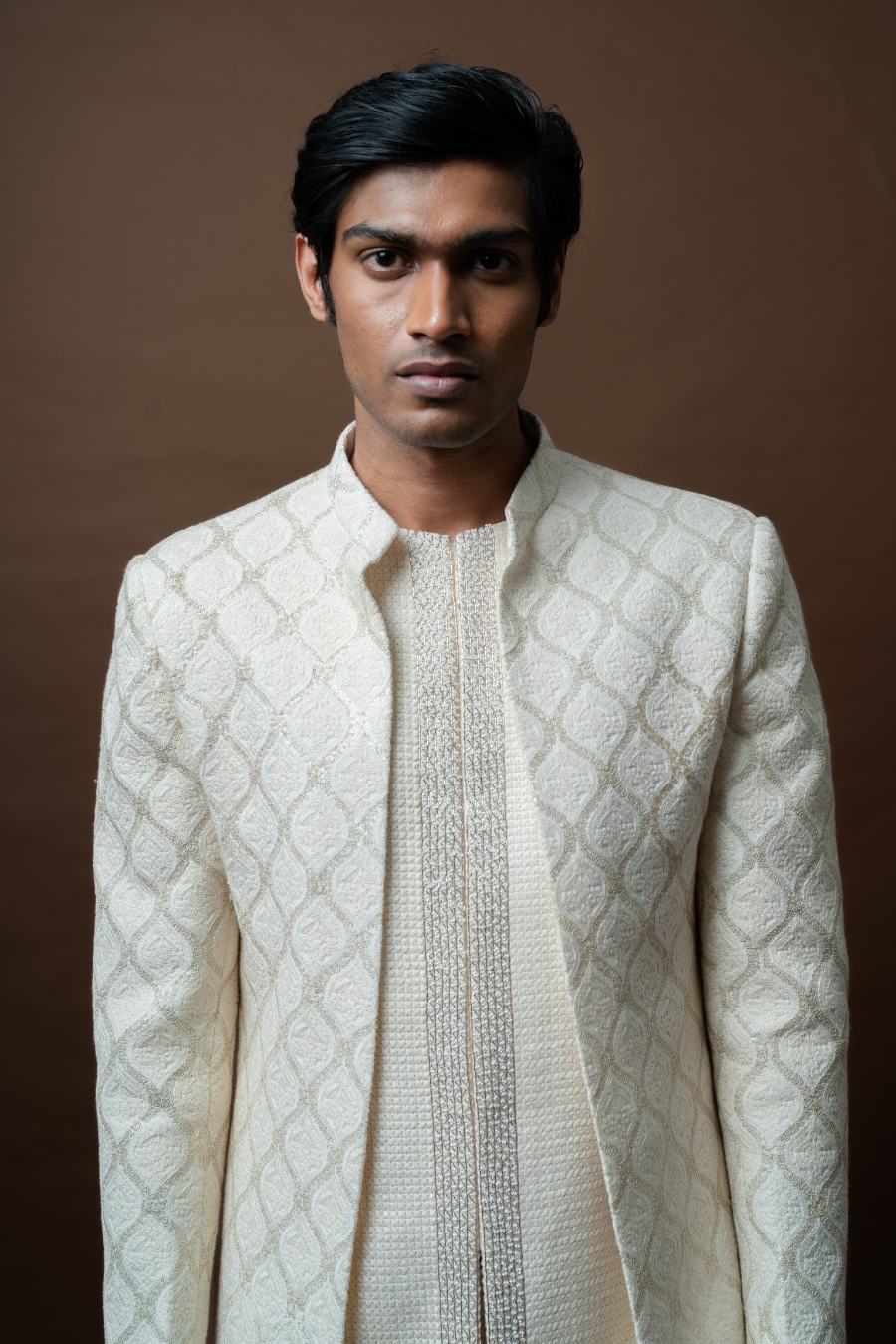 Elegant ivory embroidered Jodhpuri worn by male model, perfect for contemporary South Indian grooms.