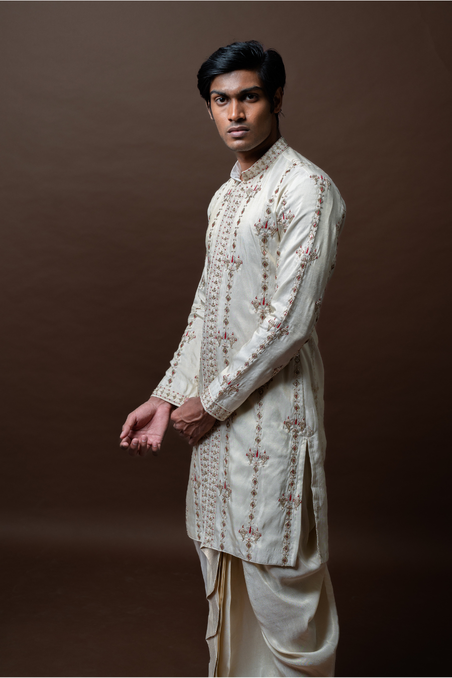 Elegance meets ethnic styling with this intricately embroidered kurta, matching dhoti, and stole—designed for grooms and special occasions in Hyderabad.