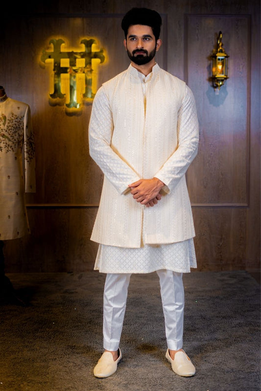Ivory sherwani Hyderabad, South Indian groom outfit, Muhurtham sherwani for men, Wedding sherwani Banjara Hills, Reception wear for groom, Pattu sherwani Hyderabad, Men’s wedding wear Hyderabad, Tejas Harish ethnic wear, Traditional groom outfit, Designer sherwani for men

